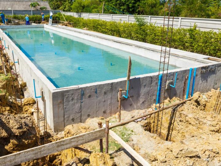 Make a Splash with Premier Swimming Pool Contractors in Broward,  ACS Construction Systems.